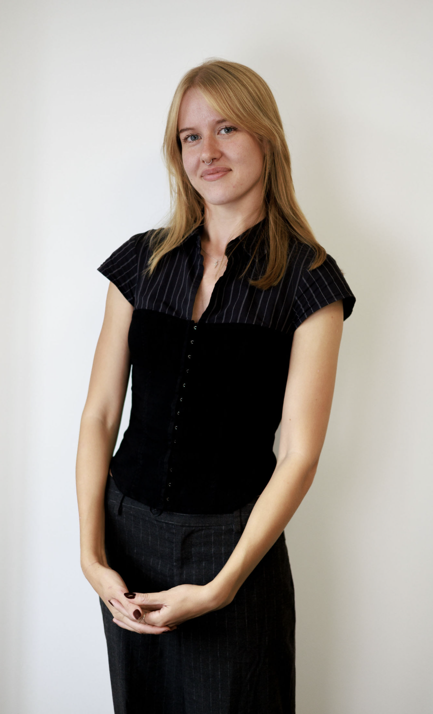 Wessex Fleet team member in a black dress