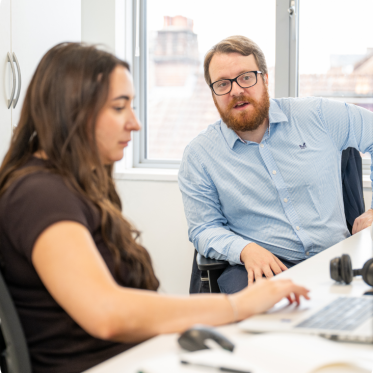 Two Wessex Fleet colleagues working together at a desk